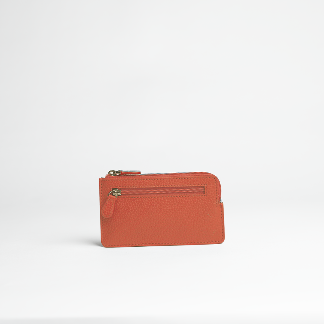 Portachiavi in pelle martellata colore arancio artigianale Aut Aut Studio – vista frontale