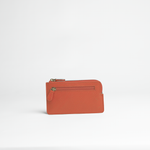 Portachiavi in pelle martellata colore arancio artigianale Aut Aut Studio – vista frontale