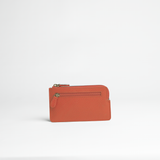 Portachiavi in pelle martellata colore arancio artigianale Aut Aut Studio – vista frontale