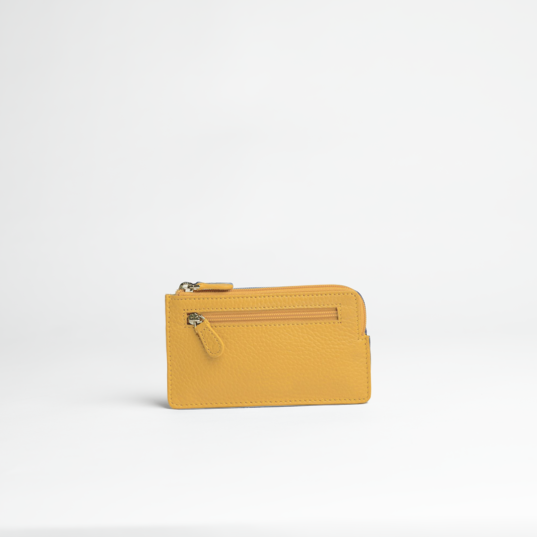 Portachiavi in pelle martellata colore giallo senape artigianale Aut Aut Studio – vista frontale