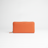 Portafoglio maxi zip around in pelle martellata colore arancio artigianale Aut Aut Studio – vista frontale
