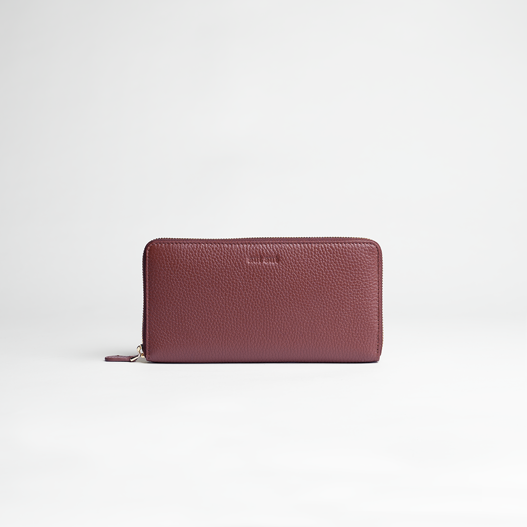 Portafoglio maxi zip around in pelle martellata colore bordo artigianale Aut Aut Studio – vista frontale