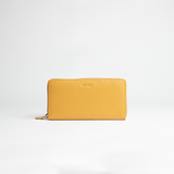Portafoglio maxi zip around in pelle martellata colore senape artigianale Aut Aut Studio – vista frontale