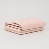 Midi wallet in hammered leather, blush color, handcrafted by Aut Aut Studio – side view