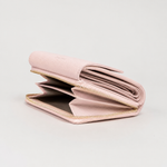Midi wallet in hammered leather, blush color, handcrafted by Aut Aut Studio – side view