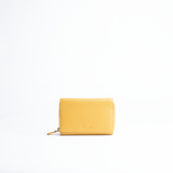 Portafoglio midi in pelle martellata colore giallo senape artigianale Aut Aut Studio – vista frontale