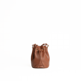 Mini bucket bag in pelle martellata colore camel artigianale Aut Aut Studio – vista frontale