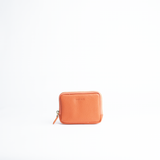 Portafoglio mini purse in pelle martellata colore arancio artigianale Aut Aut Studio – vista frontale