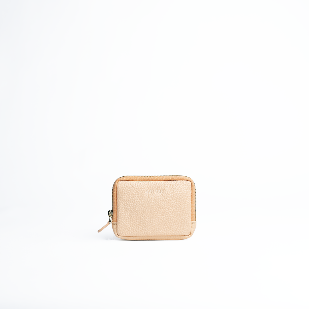Portafoglio mini purse in pelle martellata colore pesca artigianale Aut Aut Studio – vista frontale