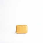 Portafoglio mini purse in pelle martellata colore senape artigianale Aut Aut Studio – vista frontale