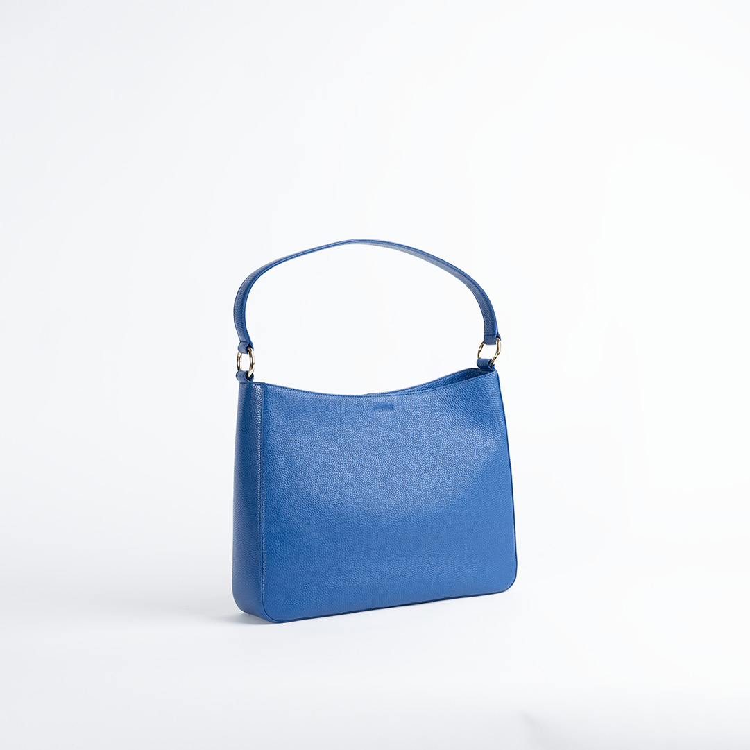 Borsa maxi in pelle martellata colore blu elettrico artigianale Aut Aut Studio – vista frontale