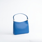 Borsa maxi in pelle martellata colore blu elettrico artigianale Aut Aut Studio – vista frontale
