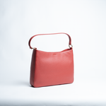 Borsa maxi in pelle martellata colore rosso artigianale Aut Aut Studio – vista frontale