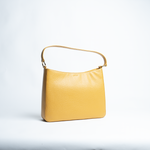 Borsa maxi in pelle martellata colore giallo senape artigianale Aut Aut Studio – vista frontale